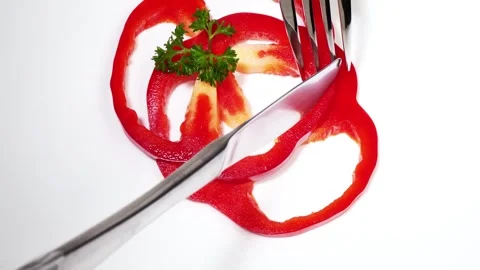 Cutting red Pepper - Vegetables with fork and knife Stock Footage 272146027