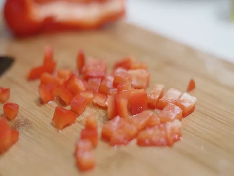 Cutting red peppers on a cutting board Stock Footage 80543529