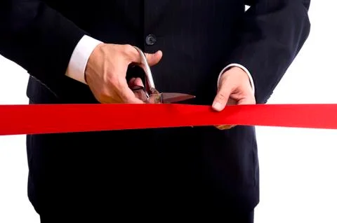 Cutting red ribbon Stock Photos