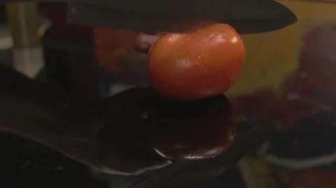 Cutting red tomato in half Stock Footage 62598257