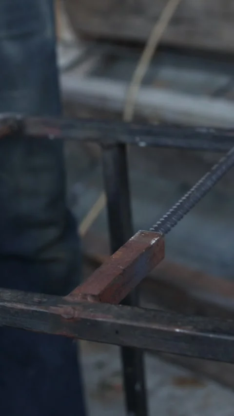 Cutting reinforcement with a grinder, close-up Stock Footage 328358728