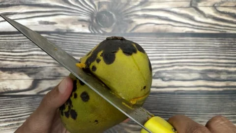 Cutting A Ripe Mango Stock Footage 322007482
