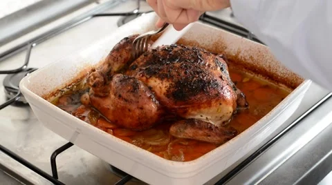 Cutting roasted chicken. Stock Footage 48922756