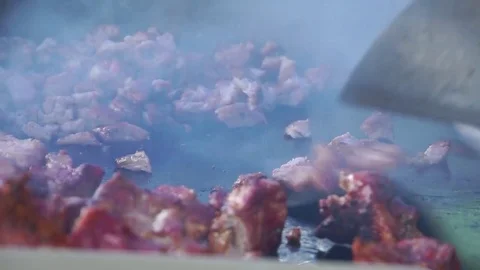 Cutting roasted meat coarsely. Stock Footage 75563249