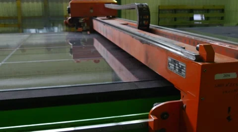 Cutting Robot Closeup, Moving by Large Sheet of Glass, Cutting of Sheet Glass Stock Footage 52873582