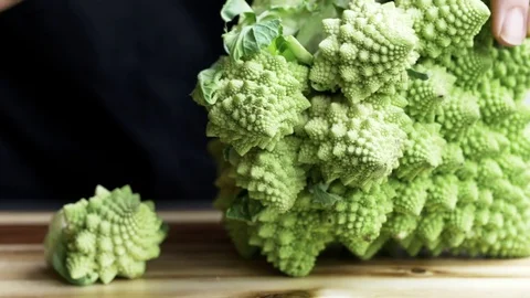 Cutting Romanesco broccoli Stock Footage 71500459