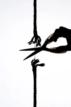 Cutting a rope Stock Photos