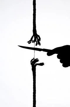 Cutting a rope Stock Photos