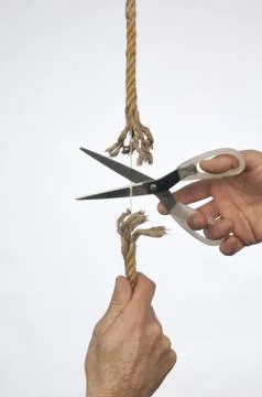 Cutting a rope Stock Photos