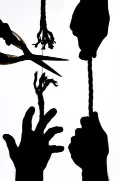 Cutting a rope Stock Photos