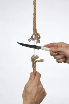Cutting a rope Stock Photos
