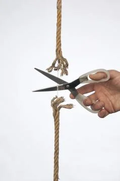 Cutting a rope Stock Photos