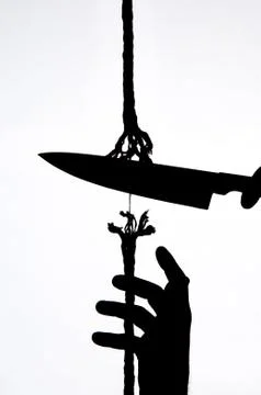Cutting a rope Stock Photos