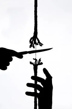 Cutting a rope Stock Photos