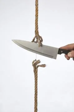 Cutting a rope Stock Photos