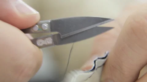 Cutting a rope with scissors Stock Footage 62350477