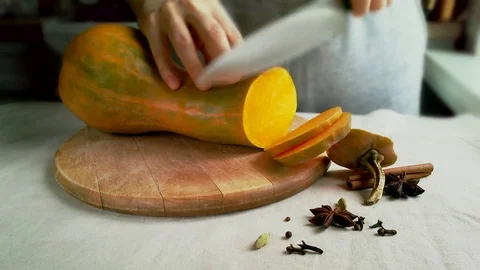Cutting round pumpkin slices Stock Footage 83107705