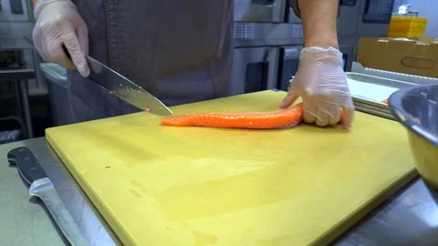 Cutting a Salmon Stock Footage 101298871