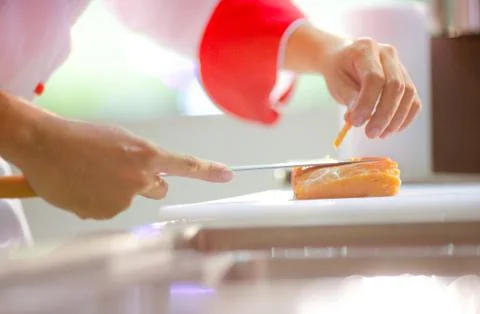 Cutting salmon Stock Photos
