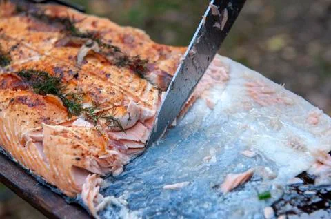Cutting salmon Stock Photos