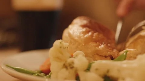 Cutting Into Savory Steak Pie in Cozy Pub Setting Stock Footage 314937032