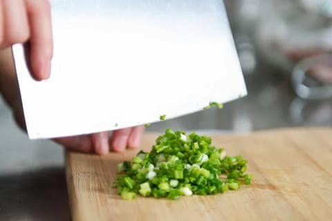 Cutting scallion Stock Photos