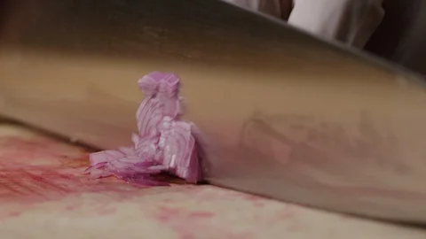 Cutting shallot onion macro shot, preparing ingredients for Tar Tar Stock-Footage 128489459