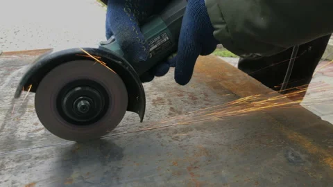Cutting sheet metal electric angular Grinder Stock Footage 160484243
