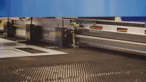 Cutting sheet metal by laser cutting cell machine with scale Stock Footage 119377083