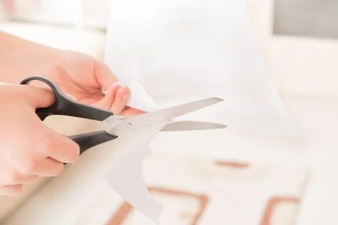 Cutting sheet of paper Stock Photos