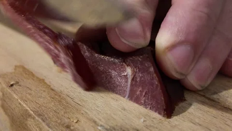 Cutting a Slice of Black Forest Cured Ham Video stock 348108660