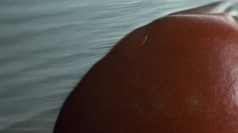 Cutting Slice of Cherry Tomato with Knife Close Macro Stock Footage 12166088