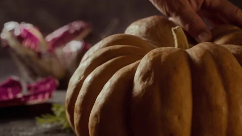 Cutting a slice of Pumpkin Stock Footage 135010473