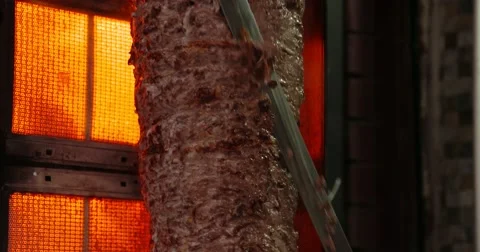 Cutting a slice of Turkish Doner Kebab Stock Footage 54596656