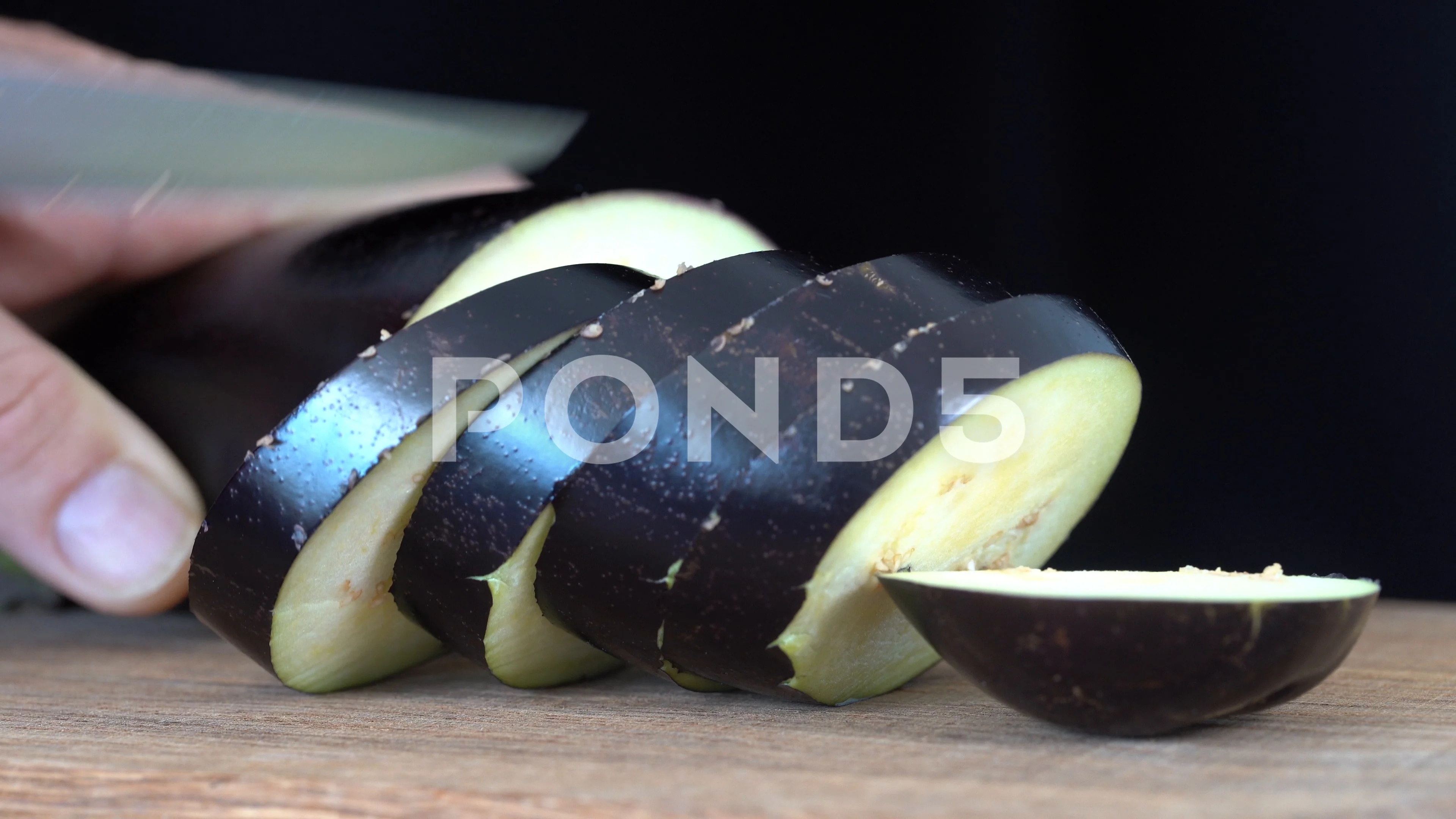 Male Hands Slicing Eggplant Knife Wooden Board Stock Photo by