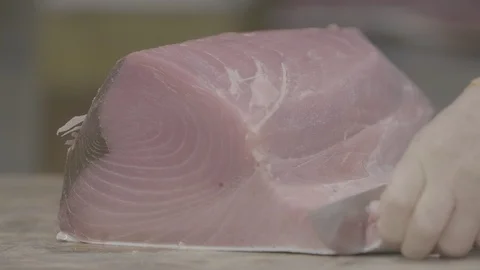 Cutting Slices From A Large Tuna Fish At The Tsukiji Fish Market In Japan11 Video stock 101320640