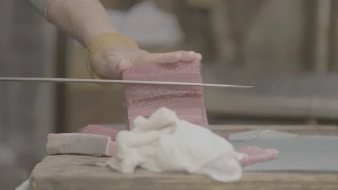 Cutting Slices From A Large Tuna Fish At The Tsukiji Fish Market In Japan14 Video stock 101322451