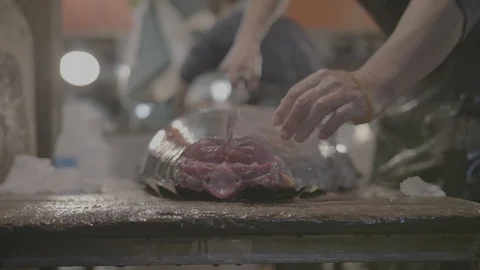 Cutting Slices From A Large Tuna Fish At The Tsukiji Fish Market In Japan16 Video stock 101327079