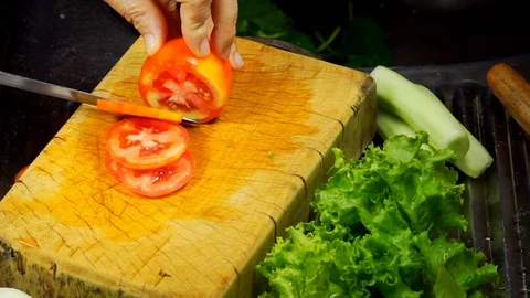 Cutting Slicing Fresh Tomato in Thin Slices Stock-Footage 130142622