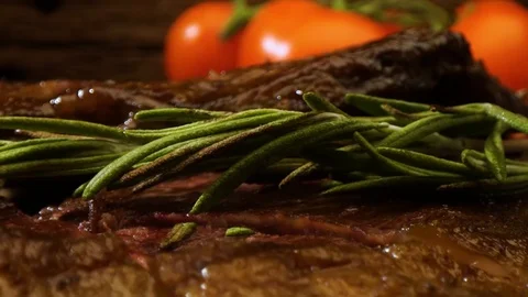 Cutting, slicing medium rare meat grilled barbecue steak with knife Stock Footage 115829959