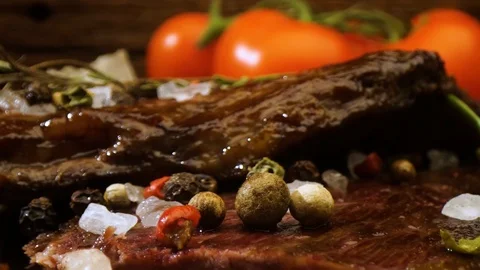 Cutting, slicing medium rare meat grilled barbecue steak with knife Stock Footage 115830019