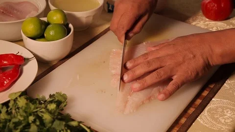 Cutting some flatfish Stock Footage 103031110