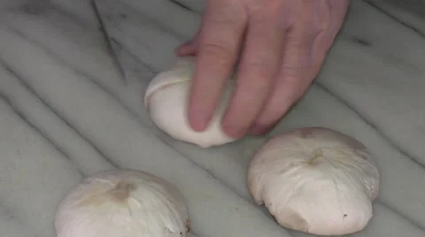 Cutting up some large flat Mushrooms Stock Footage 46688472
