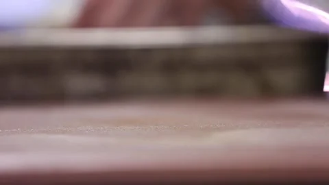 Cutting sourdough bread in a cutting board Stock Footage 133206459