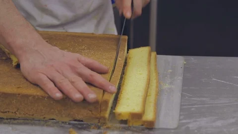 Cutting of the sponge cake  with a knife Stock Footage 85651500