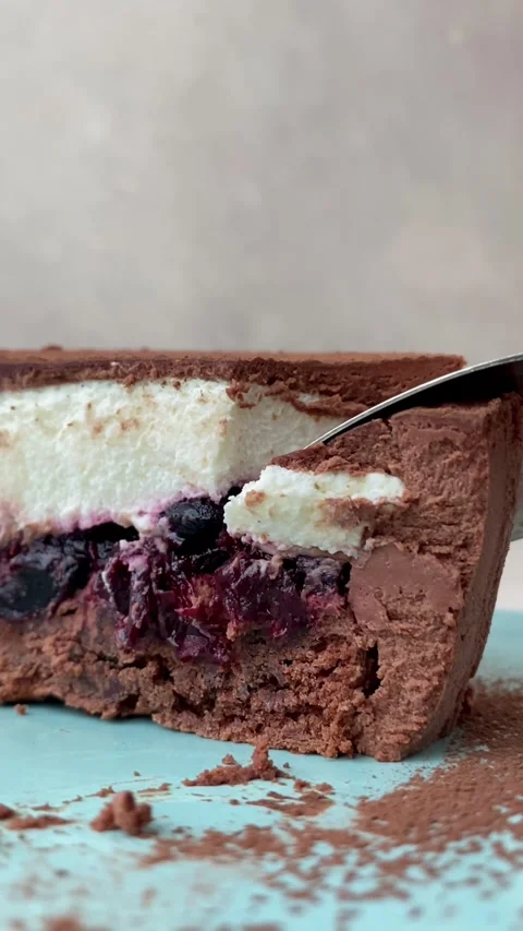 Cutting with the spoon Black Forest mousse cake Stock Footage 259666029