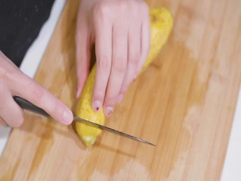 Cutting a squash on a board 스톡 동영상 80545525