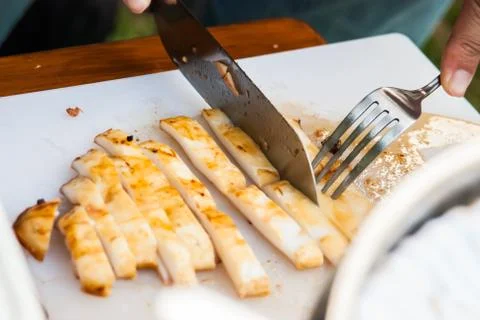 Cutting squid for eating Stock Photos
