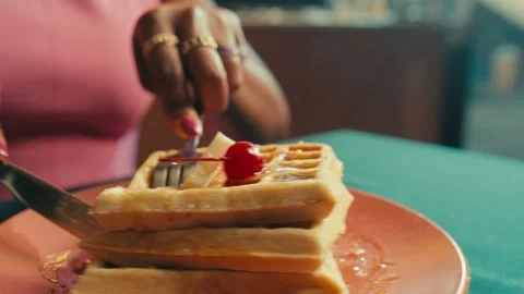 Cutting into Stack of Waffles with Syrup and Cherry Stock Footage 301276115