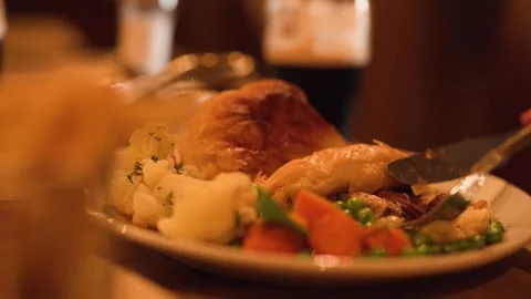 Cutting Into Steak Pie Dinner at Cozy Restaurant Table Stock Footage 317594064
